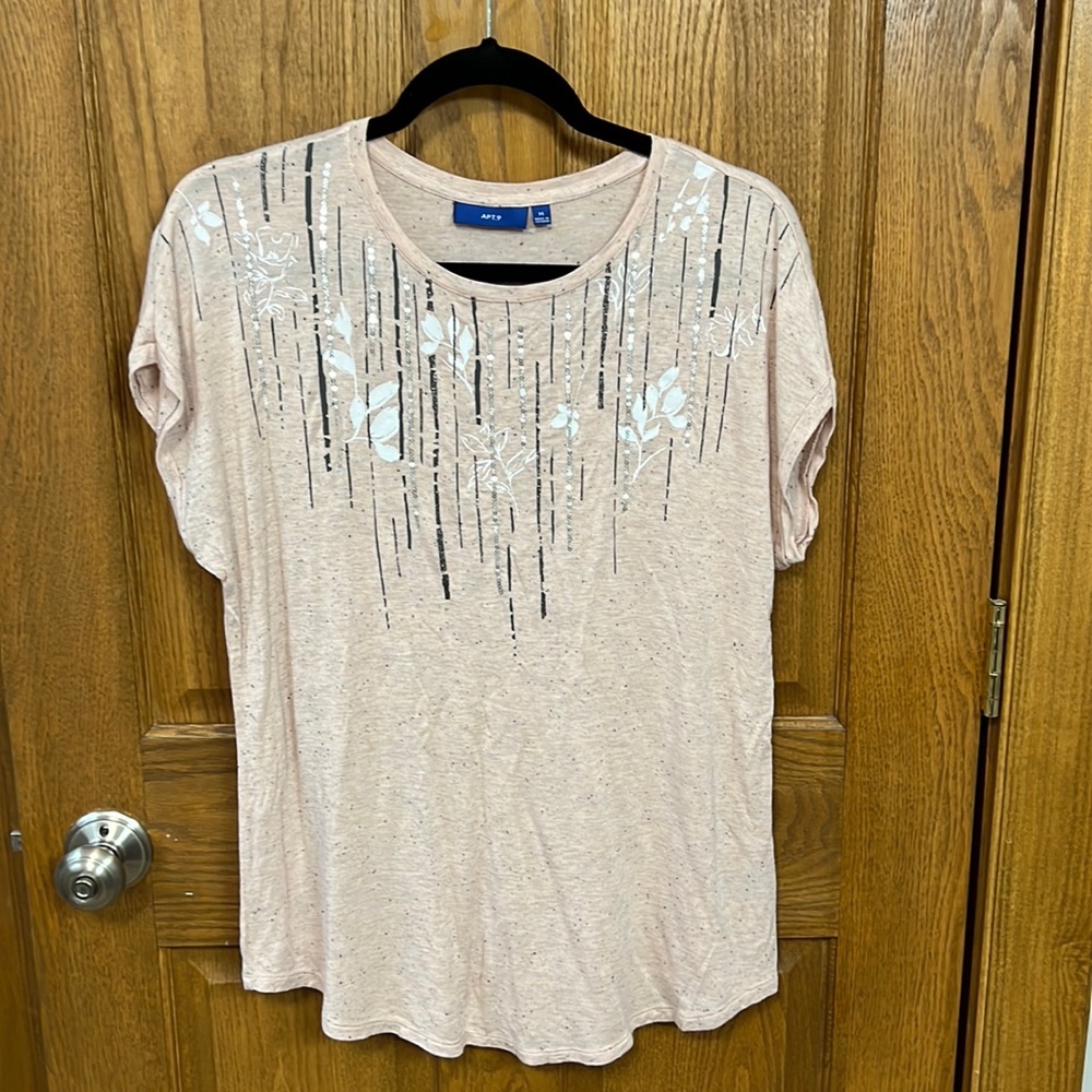 Medium tshirt, light pink with some black specks all over